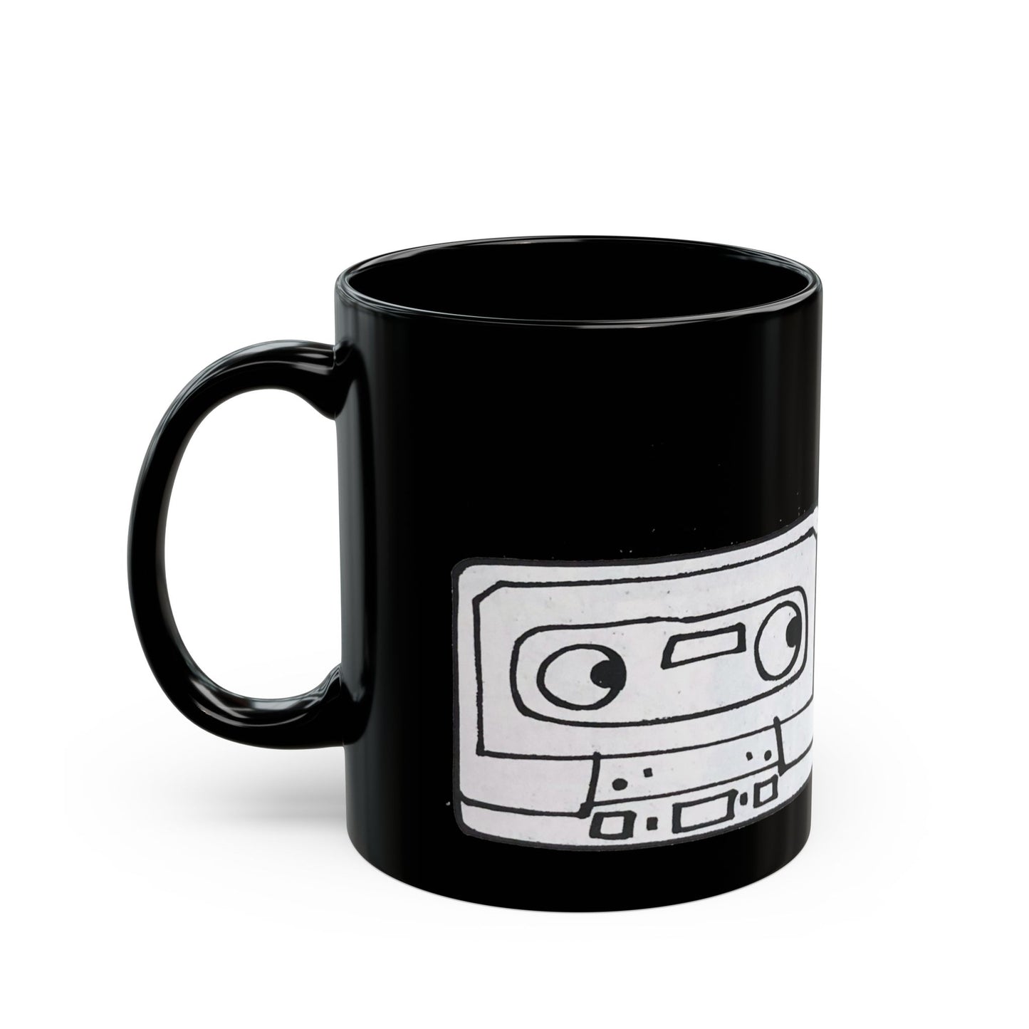 Left side view of the 11 oz black Death to Cassettes Mug featuring the cassette design.