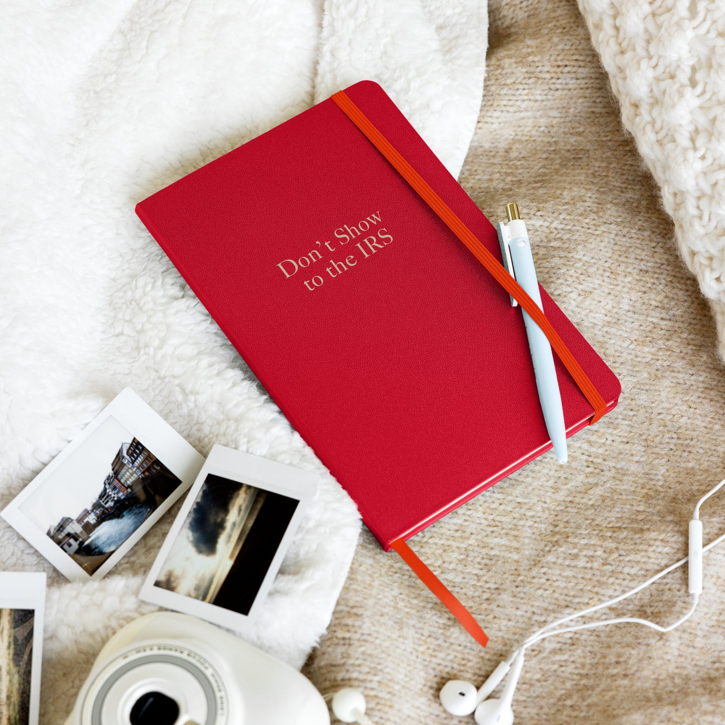 Don’t Show to the IRS Notebook in red UltraHyde hardcover, featuring bold text and sleek design.